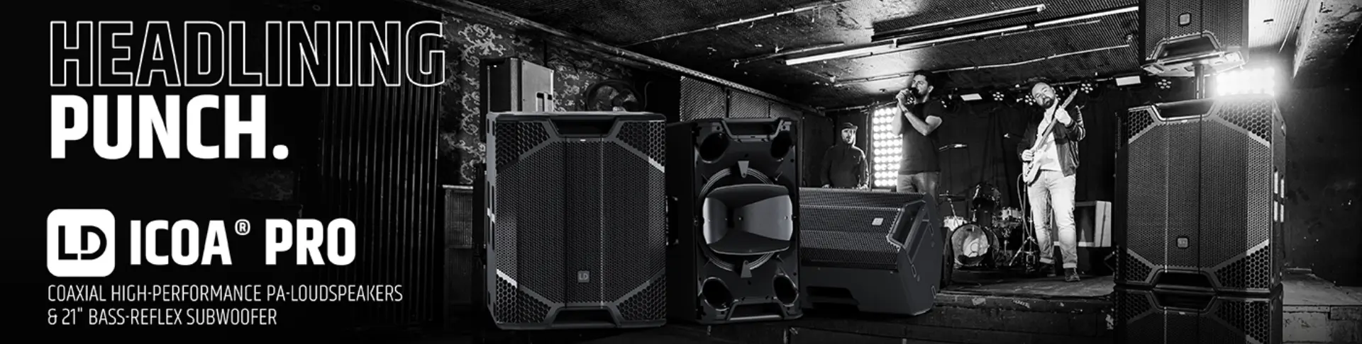 Enceintes LD Systems ICOA PRO en vente chez Dimension'Sono Vue large du système LD ICOA PRO disponible à la vente chez Dimension'Sono : enceintes coaxiales haute performance, caisson de basses 21 pouces, guitariste et batterie en arrière-plan